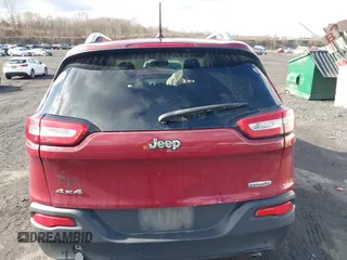 2014 Jeep Cherokee Latitude z VIN 1C4PJMCSXEW141453, wystawiony jako IAAI lot #41975311 z przebiegiem 150 085 mil mil oraz . Historia ofert i sprzedaży dostępna na DreamBid. Obrazek 16.