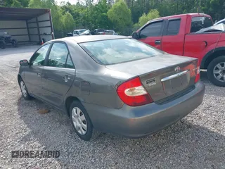 2003 Toyota Camry LE with VIN 4T1BE32K03U727447, listed as a IAAI auction lot 42118785 with 325,881 mi miles and . Bid and sale history available at DreamBid. Image 3.