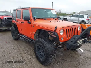2015 Jeep Wrangler Unlimited Sahara with VIN 1C4BJWEG6FL603265, listed as a IAAI auction lot 41956606 with 70,983 mi miles. Bid and sale history available at carsss.com. Image 1.