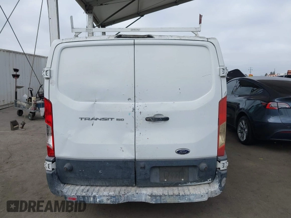 2016 Ford Transit Cargo with VIN 1FTYE9ZM9GKA01015, listed as a IAAI auction lot 42533387 with 186,555 mi miles and . Bid and sale history available at DreamBid. Image 16.