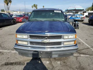1999 Chevrolet Suburban with VIN 3GNEC16RXXG254126, listed as a Copart auction lot 52051405 with 113,554 mi miles and Clean title. Bid and sale history available at DreamBid. Image 5.