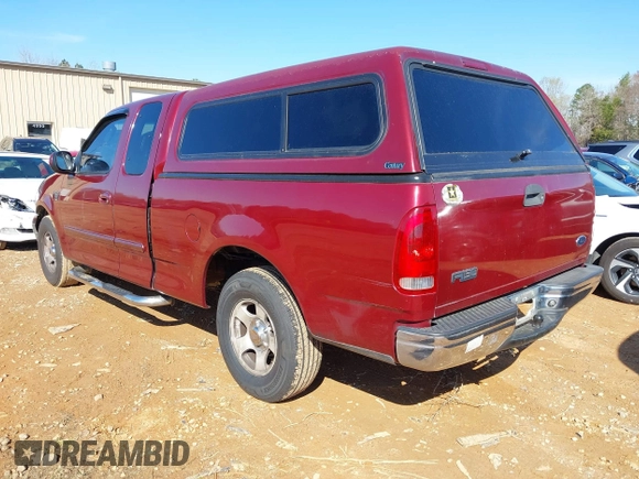 2003 Ford F-150 XL with VIN 1FTRX17W43NA07186, listed as a IAAI auction lot 41864354 with 123,565 mi miles. Bid and sale history available at carsss.com. Image 3.