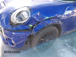 2020 MINI Hardtop Cooper S z VIN WMWXR5C05L2L43423, wystawiony jako IAAI lot #41577721 z przebiegiem 108 123 mil mil oraz . Historia ofert i sprzedaży dostępna na DreamBid. Obrazek 6.