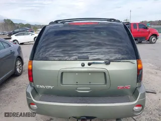 2004 GMC Envoy SLE with VIN 1GKDS13S442240682, listed as a IAAI auction lot 41764185 with 139,348 mi miles. Bid and sale history available at carsss.com. Image 17.