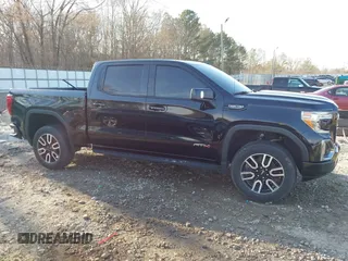 2021 GMC Sierra 1500 AT4 with VIN 1GTP9EEL4MZ450434, listed as a IAAI auction lot 41682550 with 64,336 mi miles. Bid and sale history available at carsss.com. Image 6.