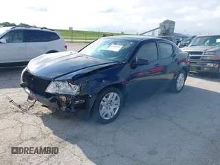 2014 Dodge Avenger SE with VIN 1C3CDZAB1EN111015, listed as a IAAI auction lot 42330669 with 82,265 mi miles and . Bid and sale history available at DreamBid. Image 2.