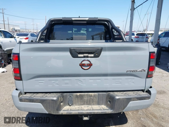 2023 Nissan Frontier Pro-4X z VIN 1N6ED1EKXPN641323, wystawiony jako IAAI lot #42227180 z przebiegiem 25 199 mil mil oraz . Historia ofert i sprzedaży dostępna na DreamBid. Obrazek 16.