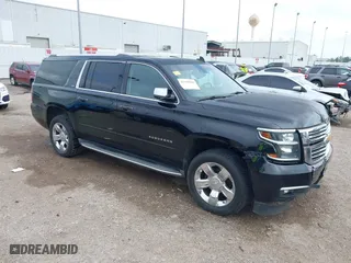 2015 Chevrolet Suburban LTZ with VIN 1GNSCKKC3FR157939, listed as a IAAI auction lot 41168203 with 197,810 mi miles. Bid and sale history available at carsss.com. Image 1.
