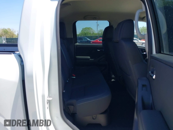 2024 Nissan Frontier SV with VIN 1N6ED1EJ0RN634679, listed as a IAAI auction lot 42075250 with 2,296 mi miles and . Bid and sale history available at DreamBid. Image 8.