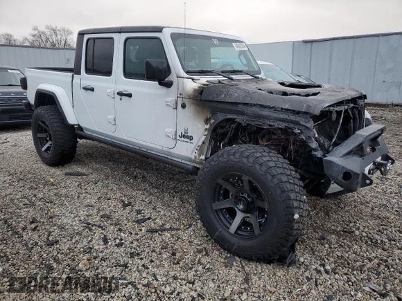2022 Jeep Gladiator Sport S with VIN 1C6JJTAG1NL148203, listed as a Copart auction lot 46662015 with 1,900 mi miles and Non repairable. Bid and sale history available at DreamBid. Image 4.