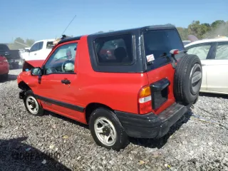 1999 Chevrolet Tracker z VIN 2CNBE1862X6931542, wystawiony jako Copart lot #72216254 z przebiegiem 179 527 mil mil oraz Szkoda całkowita • Salvage title. Historia ofert i sprzedaży dostępna na DreamBid. Obrazek 2.