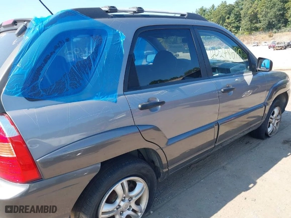 2008 Kia Sportage LX with VIN KNDJE723887542245, listed as a IAAI auction lot 40248690 with 122,558 mi miles. Bid and sale history available at carsss.com. Image 14.