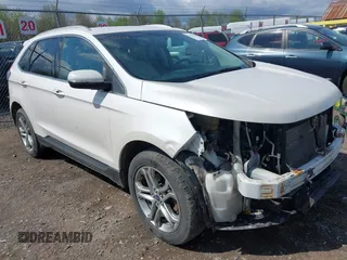 2015 Ford Edge Titanium z VIN 2FMTK4K83FBC10452, wystawiony jako IAAI lot #42162436 z przebiegiem 157 316 mil mil oraz . Historia ofert i sprzedaży dostępna na DreamBid. Obrazek 1.