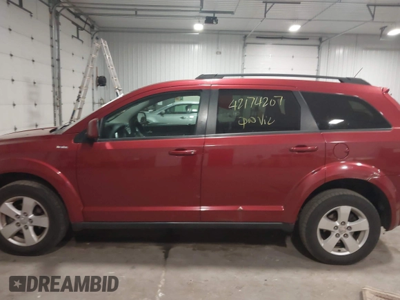 2011 Dodge Journey Mainstreet with VIN 3D4PG1FG3BT527950, listed as a IAAI auction lot 42174207 with 168,116 mi miles and . Bid and sale history available at DreamBid. Image 14.