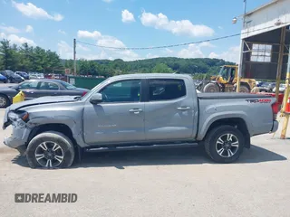 2019 Toyota Tacoma SR with VIN 3TMCZ5AN1KM274625, listed as a IAAI auction lot 42660593 with 163,460 mi miles and . Bid and sale history available at DreamBid. Image 14.