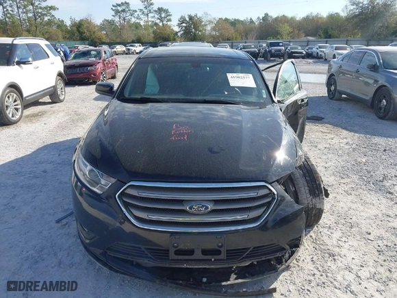 2018 Ford Taurus SEL with VIN 1FAHP2E85JG102966, listed as a IAAI auction lot 41902577 with 115,657 mi miles. Bid and sale history available at carsss.com. Image 12.