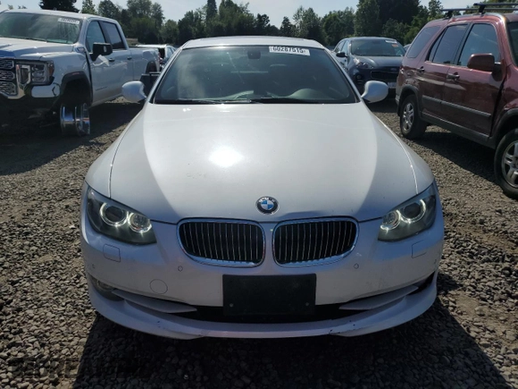 2011 BMW 3 Series 335i xDrive with VIN WBAKF9C51BE620023, listed as a Copart auction lot 60287515 with 123,353 mi miles and Salvage title. Bid and sale history available at DreamBid. Image 5.