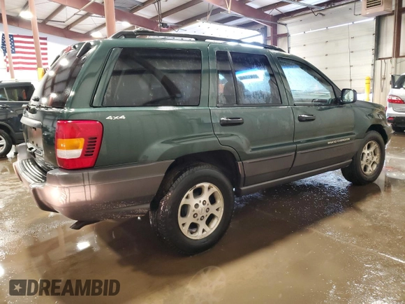 2000 Jeep Grand Cherokee Laredo with VIN 1J4GW48S2YC256123, listed as a Copart auction lot 56015855 with 147,549 mi miles and Salvage title. Bid and sale history available at DreamBid. Image 3.