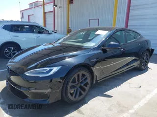 2021 Tesla Model S Long Range z VIN 5YJSA1E54MF429360, wystawiony jako IAAI lot #42662440 z przebiegiem 36 395 mil mil oraz . Historia ofert i sprzedaży dostępna na DreamBid. Obrazek 2.
