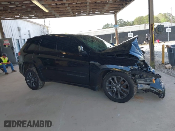 2018 Jeep Grand Cherokee Overland z VIN 1C4RJFCG3JC322406, wystawiony jako IAAI lot #41935874 z przebiegiem 82 932 mil mil oraz . Historia ofert i sprzedaży dostępna na DreamBid. Obrazek 13.