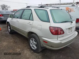 2000 Lexus RX with VIN JT6GF10U8Y0057605, listed as a IAAI auction lot 41519027 with 332,955 mi miles and . Bid and sale history available at carsss.com. Image 3.