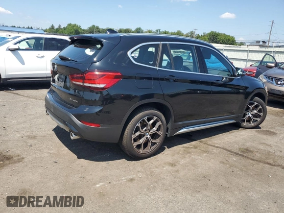 2021 BMW X1 xDrive28i with VIN WBXJG9C06M5S33201, listed as a Copart auction lot 66391015 with 53,395 mi miles and Salvage title. Bid and sale history available at DreamBid. Image 3.