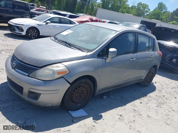 2008 Nissan Versa 1.8 S with VIN 3N1BC13E08L406990, listed as a IAAI auction lot 42080031 with 175,008 mi miles. Bid and sale history available at carsss.com. Image 2.