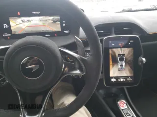 2023 McLaren Artura z VIN SBM16AEA4PW001953, wystawiony jako Copart lot #88790405 z przebiegiem 6864 mil mil oraz Nie do naprawy. Historia ofert i sprzedaży dostępna na DreamBid. Obrazek 10.