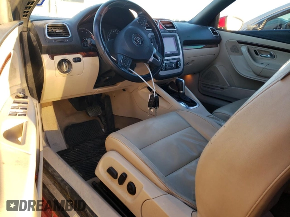 2012 Volkswagen Eos Lux with VIN WVWFW7AH7CV001093, listed as a Copart auction lot 85584384 with 105,464 mi miles and Salvage Title. Bid and sale history available at DreamBid. Image 8.