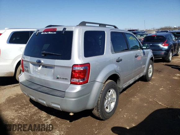 2009 Ford Escape Hybrid with VIN 1FMCU59309KA99802, listed as a Copart auction lot 76239904 with 109,711 mi miles and Non repairable. Bid and sale history available at DreamBid. Image 3.