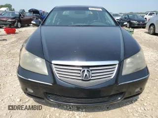 2006 Acura RL with VIN JH4KB16586C003133, listed as a Copart auction lot 63238494 with 228,039 mi miles and Salvage Title. Bid and sale history available at DreamBid. Image 5.