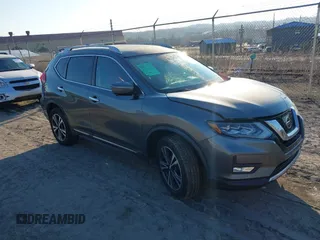 2017 Nissan Rogue SV with VIN JN8AT2MV2HW020552, listed as a IAAI auction lot 41693202 with 97,524 mi miles. Bid and sale history available at carsss.com. Image 1.