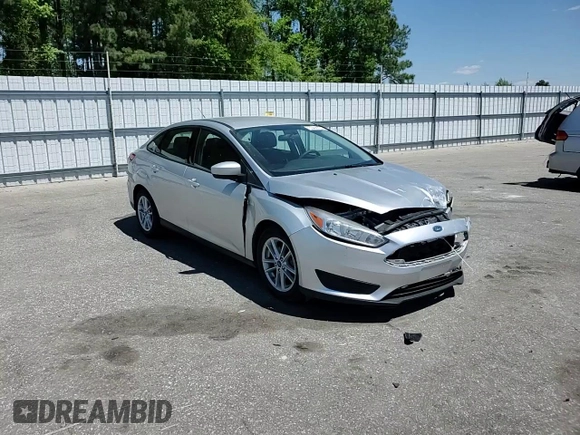 2018 Ford Focus SE with VIN 1FADP3FE0JL202442, listed as a Copart auction lot 53468725 with 106,119 mi miles and Salvage title. Bid and sale history available at DreamBid. Image 10.