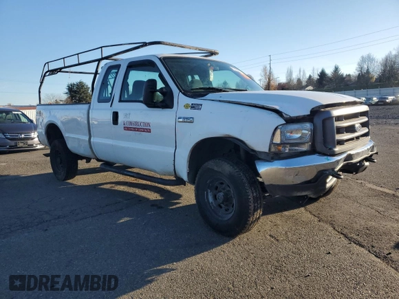 2002 Ford F-350 XL with VIN 1FTSX31S72ED14126, listed as a Copart auction lot 82688484 with 202,780 mi miles and Salvage Title. Bid and sale history available at DreamBid. Image 4.