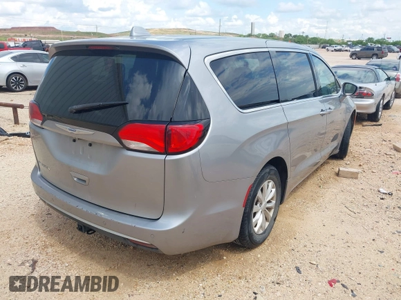 2018 Chrysler Pacifica Touring Plus z VIN 2C4RC1FG5JR280143, wystawiony jako IAAI lot #42350483 z przebiegiem 103 460 mil mil oraz . Historia ofert i sprzedaży dostępna na DreamBid. Obrazek 4.