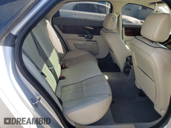 2014 Jaguar XJ Portfolio with VIN SAJWA2GZ2E8V70065, listed as a Copart auction lot 43872505 with 138,677 mi miles and Salvage title. Bid and sale history available at DreamBid. Image 10.