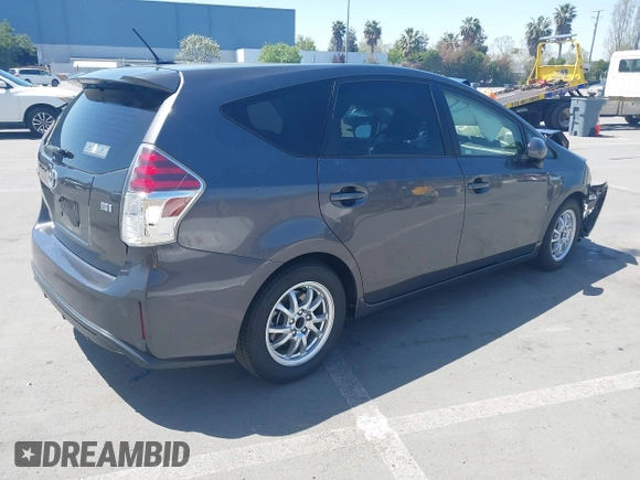 2015 Toyota Prius Two with VIN JTDZN3EUXFJ027926, listed as a IAAI auction lot 42036024 with 104,976 mi miles and . Bid and sale history available at DreamBid. Image 4.
