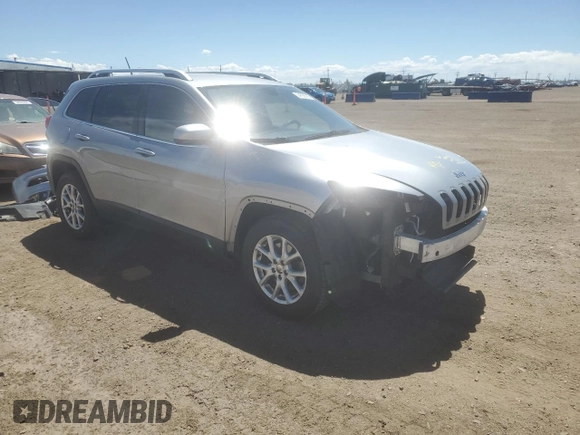 2015 Jeep Cherokee Latitude with VIN 1C4PJMCB6FW734003, listed as a Copart auction lot 54659085 with 146,379 mi miles and Salvage Title. Bid and sale history available at DreamBid. Image 4.