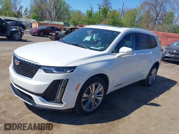 2023 Cadillac XT6 AWD Premium Luxury z VIN 1GYKPDRS4PZ182799, wystawiony jako IAAI lot #42161097 z przebiegiem 22 776 mil mil oraz . Historia ofert i sprzedaży dostępna na DreamBid. Obrazek 2.