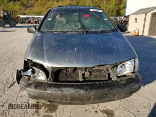 1999 Toyota Sienna LE with VIN 4T3ZF13C4XU137126, listed as a Copart auction lot 75205074 with 0 mi miles and Salvage Title. Bid and sale history available at carsss.com. Image 5.