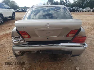 1999 Mercedes-Benz E-Class with VIN WDBJF65HXXA891437, listed as a Copart auction lot 73278334 with 197,159 mi miles and Salvage Title. Bid and sale history available at carsss.com. Image 6.