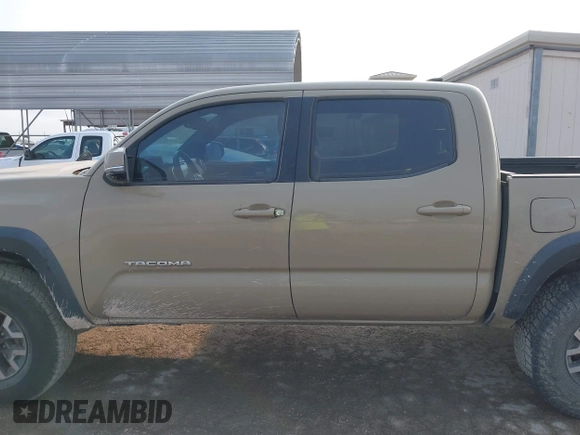 2017 Toyota Tacoma SR5 with VIN 5TFCZ5AN7HX097307, listed as a IAAI auction lot 42337528 with 98,000 mi miles and . Bid and sale history available at DreamBid. Image 14.