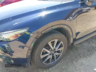 2018 Mazda CX-5 Grand Touring with VIN JM3KFADM1J0322049, listed as a IAAI auction lot 41891079 with 174,939 mi miles and . Bid and sale history available at DreamBid. Image 17.