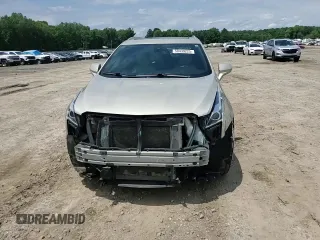 2017 Cadillac XT5 Luxury FWD with VIN 1GYKNBRS3HZ210457, listed as a Copart auction lot 58439225 with 139,938 mi miles and Salvage title. Bid and sale history available at DreamBid. Image 14.