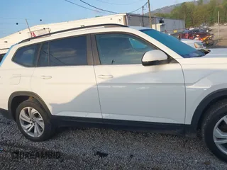 2021 Volkswagen Atlas SE z VIN 1V2WR2CA7MC595822, wystawiony jako IAAI lot #41957158 z przebiegiem 41 447 mil mil oraz . Historia ofert i sprzedaży dostępna na DreamBid. Obrazek 13.