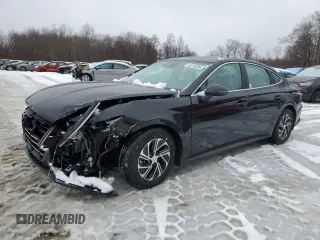 2023 Hyundai Sonata Hybrid Blue with VIN KMHL24JJ6PA057986, listed as a Copart auction lot 43210205 with 76,255 mi miles and Salvage Title. Bid and sale history available at carsss.com. Image 1.