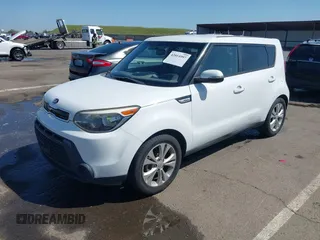 2014 Kia Soul + with VIN KNDJP3A58E7036528, listed as a IAAI auction lot 42014997 with 156,853 mi miles. Bid and sale history available at carsss.com. Image 2.