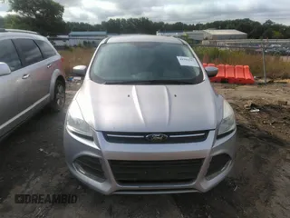 2016 Ford Escape SE z VIN 1FMCU9GX3GUC71786, wystawiony jako IAAI lot #42392157 z przebiegiem 168 578 mil mil oraz . Historia ofert i sprzedaży dostępna na DreamBid. Obrazek 12.