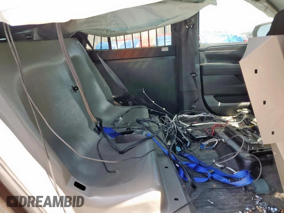 2023 Chevrolet Tahoe Commercial with VIN 1GNSCLEDXPR447042, listed as a Copart auction lot 52399275 with 22,205 mi miles and Salvage title. Bid and sale history available at DreamBid. Image 11.