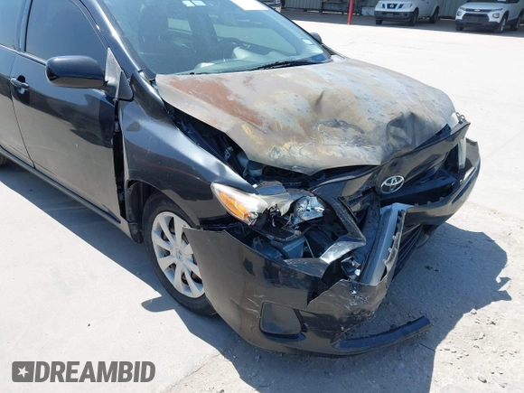 2011 Toyota Corolla L with VIN JTDBU4EE9BJ096586, listed as a IAAI auction lot 41992120 with 201,297 mi miles. Bid and sale history available at carsss.com. Image 6.